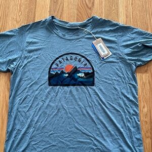 Patagonia Teal Graphic Women’s cool daily Tee shirt short sleeve NWT size Large